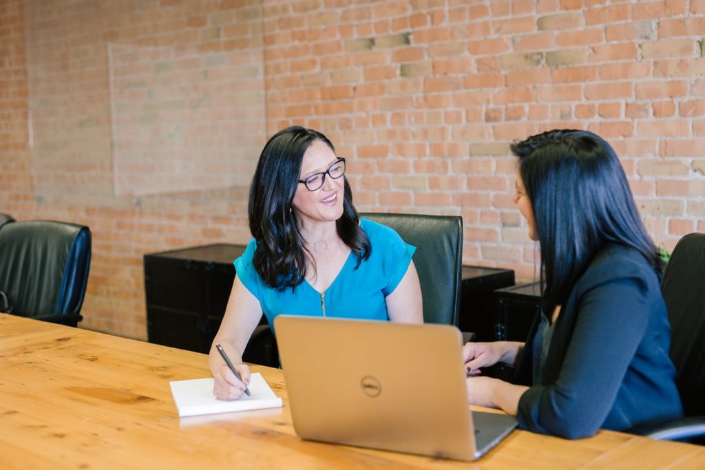 women in front of laptop