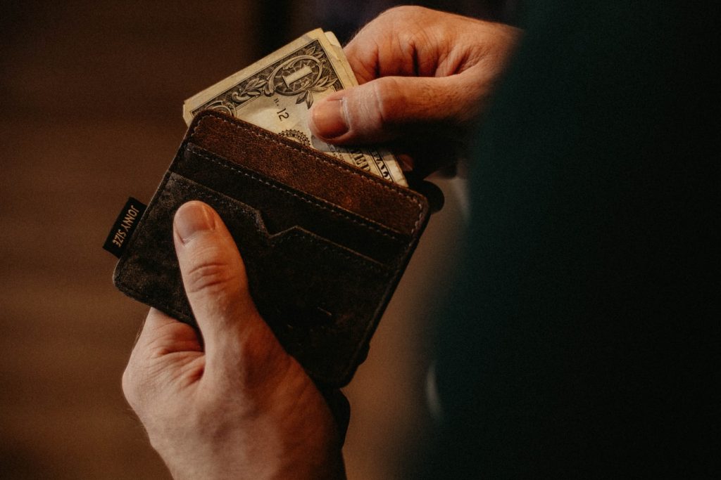 Putting money in a wallet